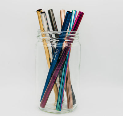 stainless steel reusable bubble tea straws in a jar