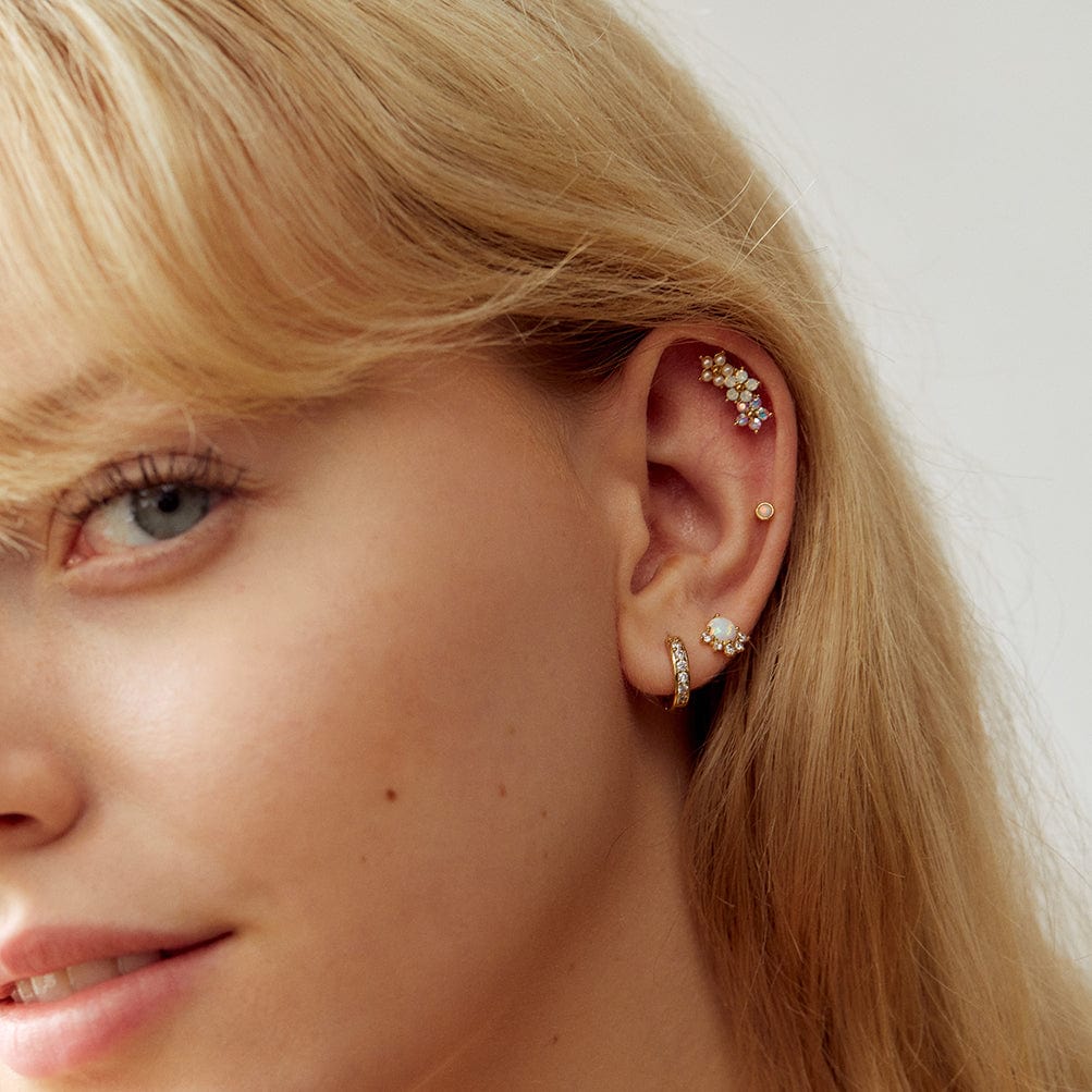 Floral climber earrings by Lover's Tempo, worn on the ear