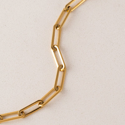 Bold paperclip necklace in gold by Lover's Tempo, styled photo