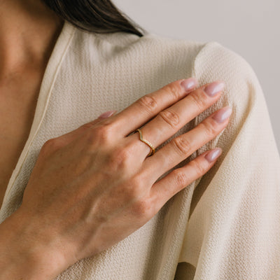 Chevron CZ ring in gold by Lover's Tempo, on the hand