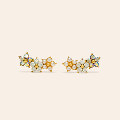 Floral climber earrings in white by Lover's Tempo