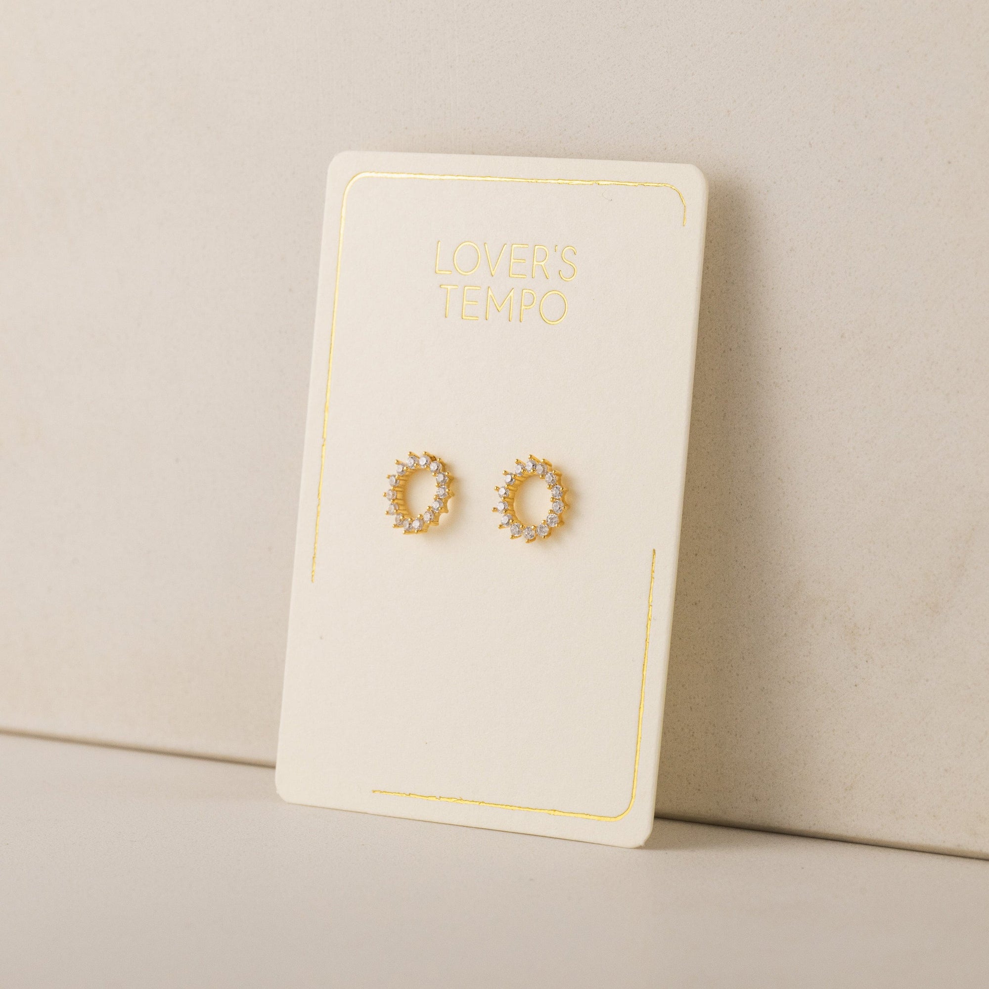 Halo stud earrings in gold by Lover's Tempo, side view