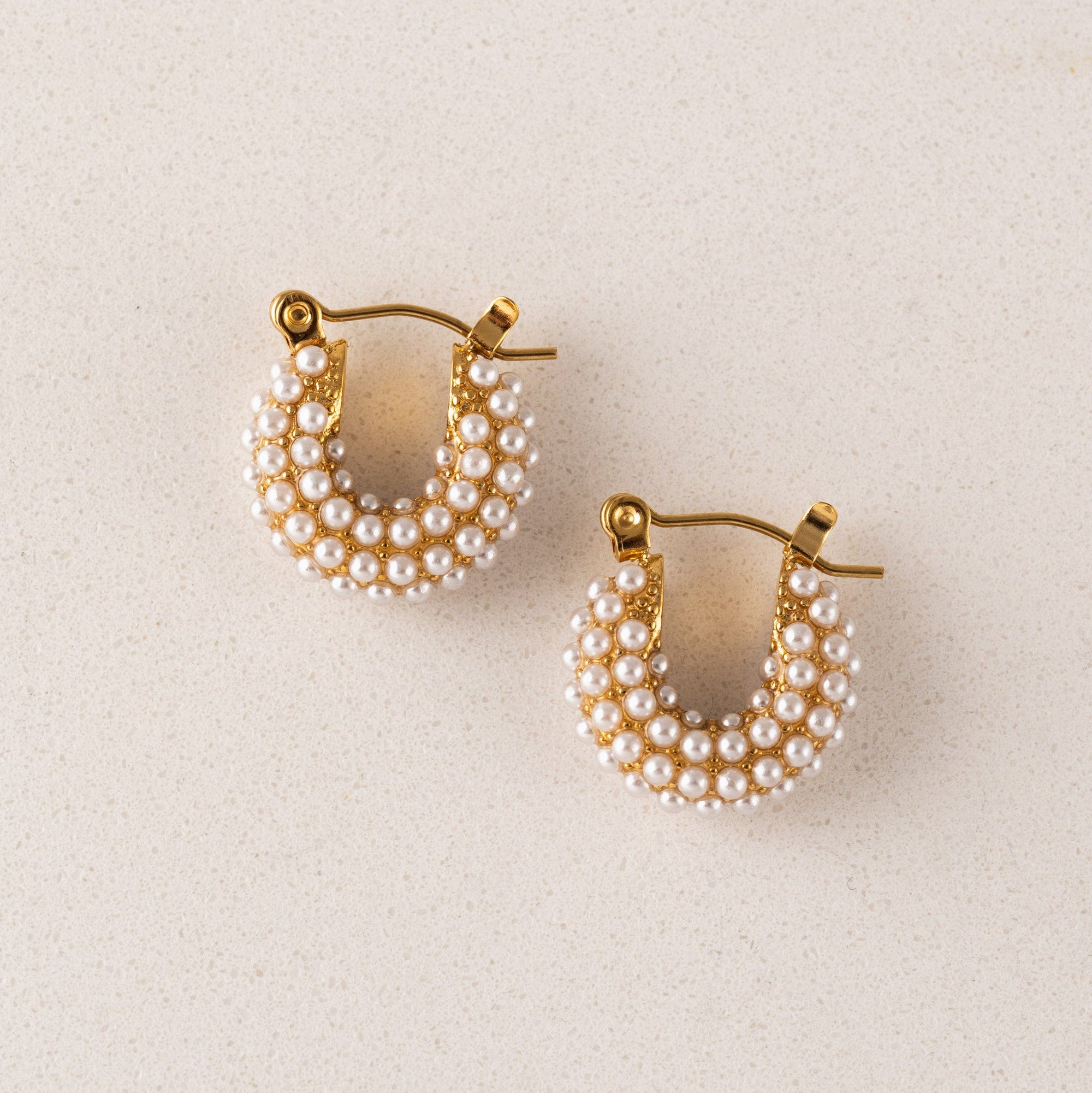 Perla pearl hoop earrings in gold by Lover's Tempo, close-up