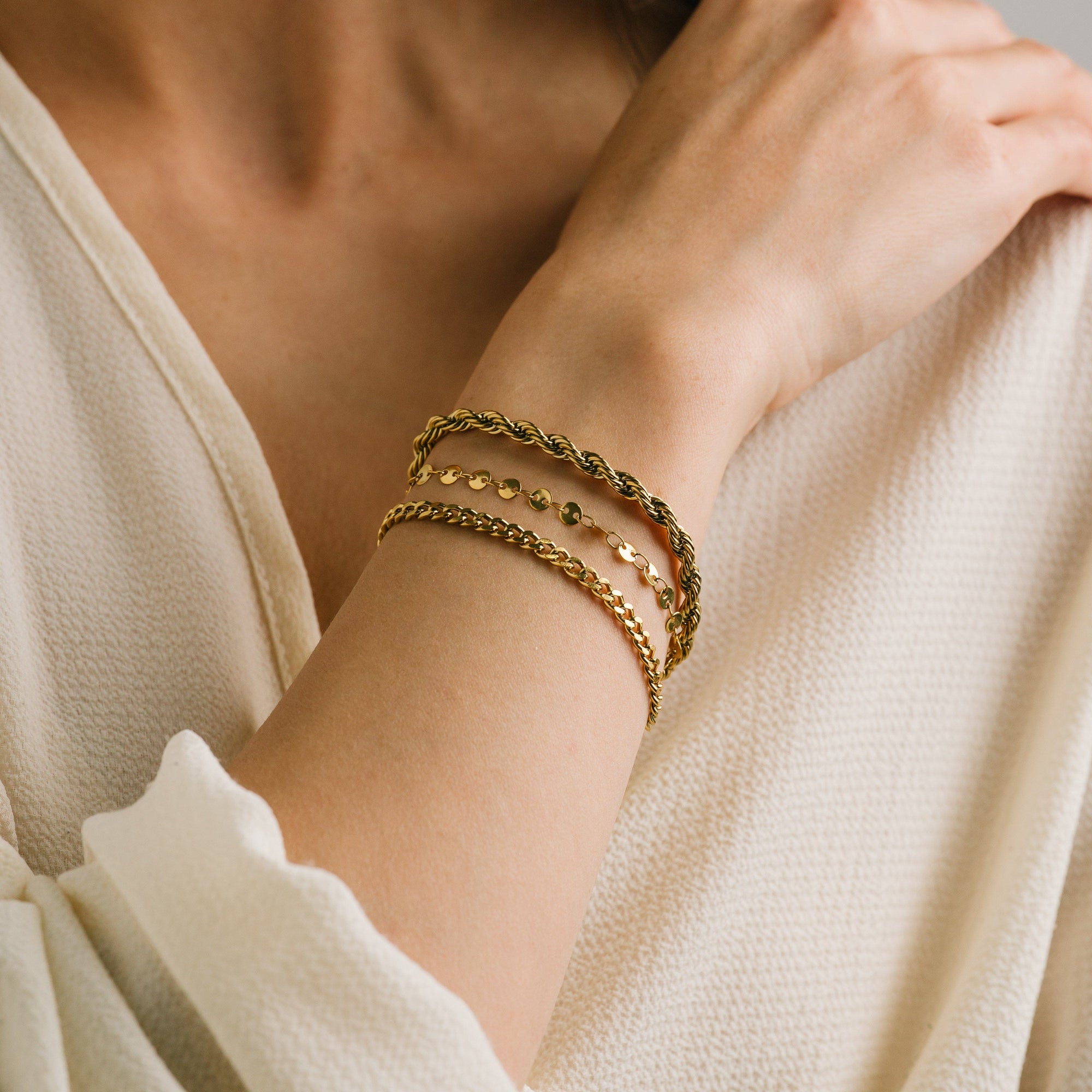 Reef layered bracelet in gold by Lover's Tempo, on the wrist