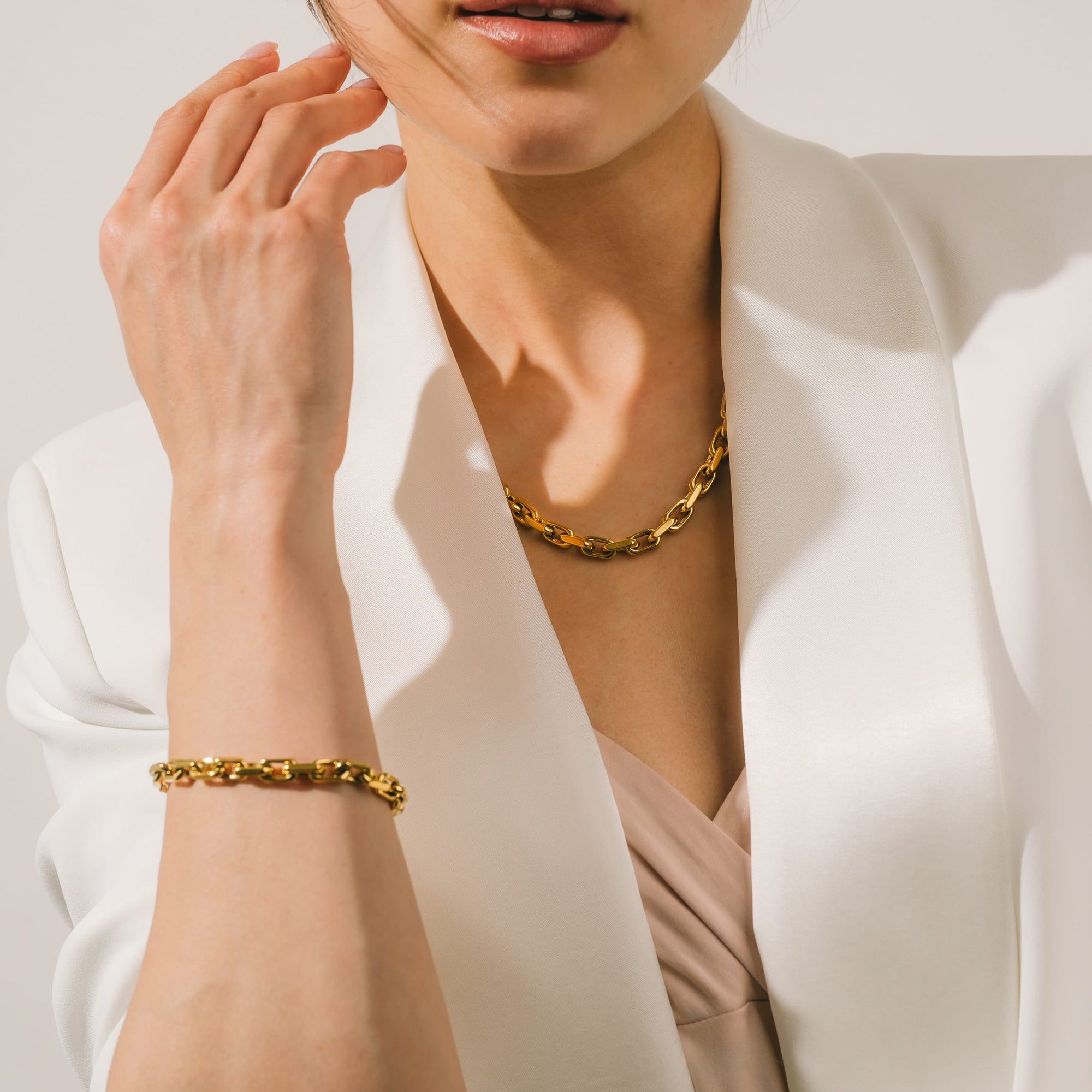 Veya chain bracelet and necklace in gold by Lover's Tempo, worn together
